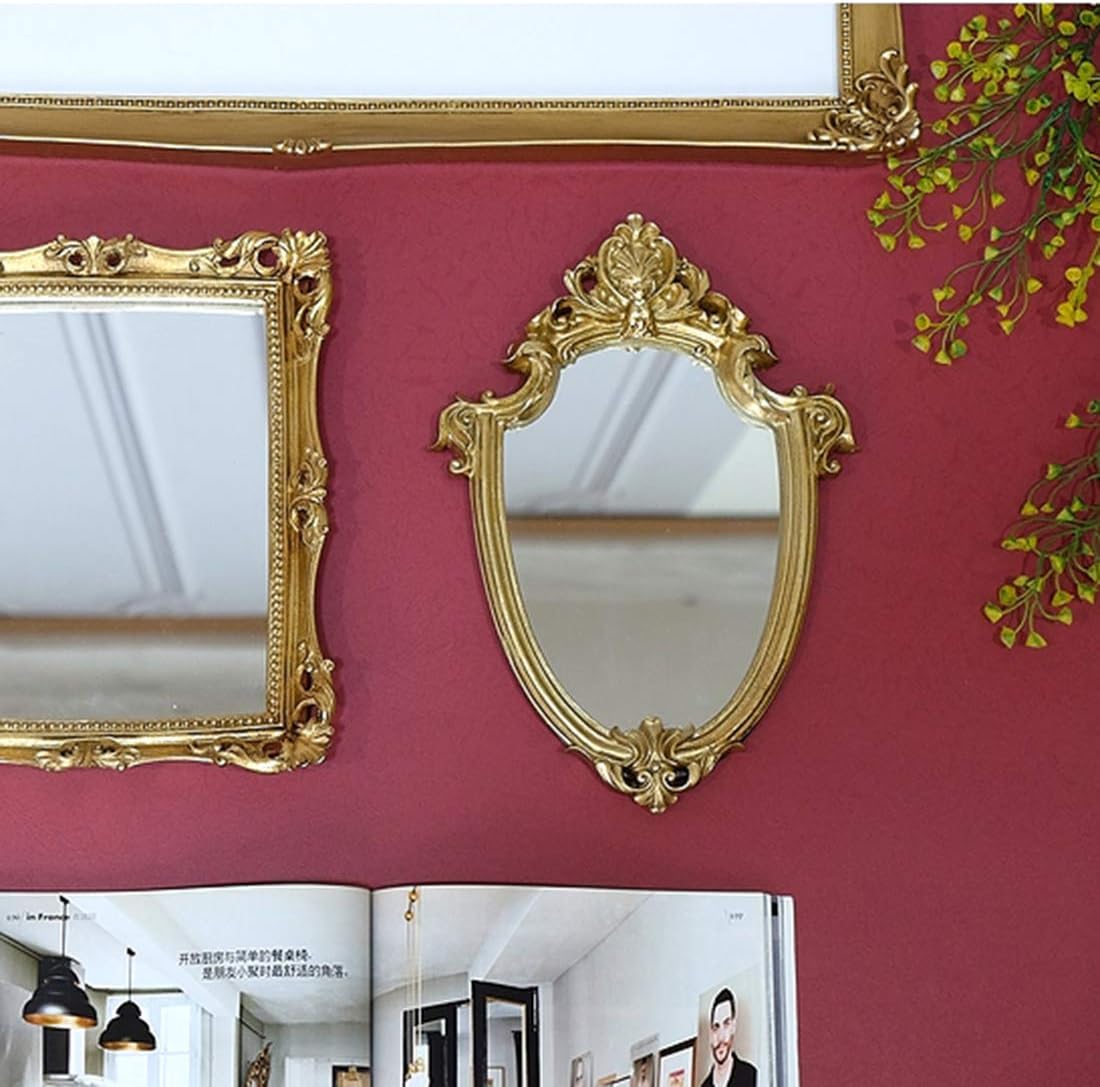 Ornate gold wall mirror with baroque detailing, styled for glam dorm or vanity décor