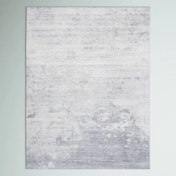 Serene shaded grey rug for dorm decor.