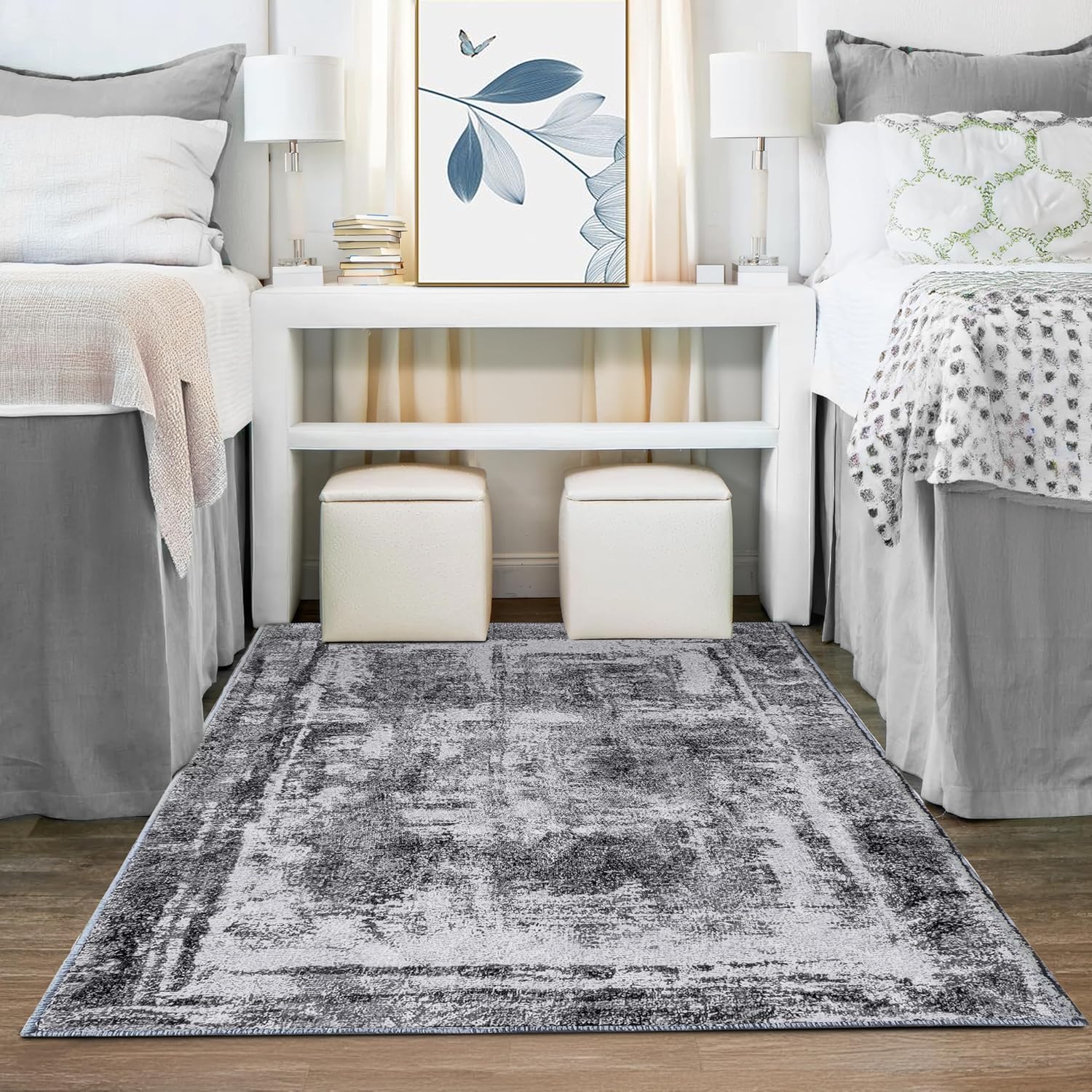 Shades of grey abstract rug in a dorm room setting. 