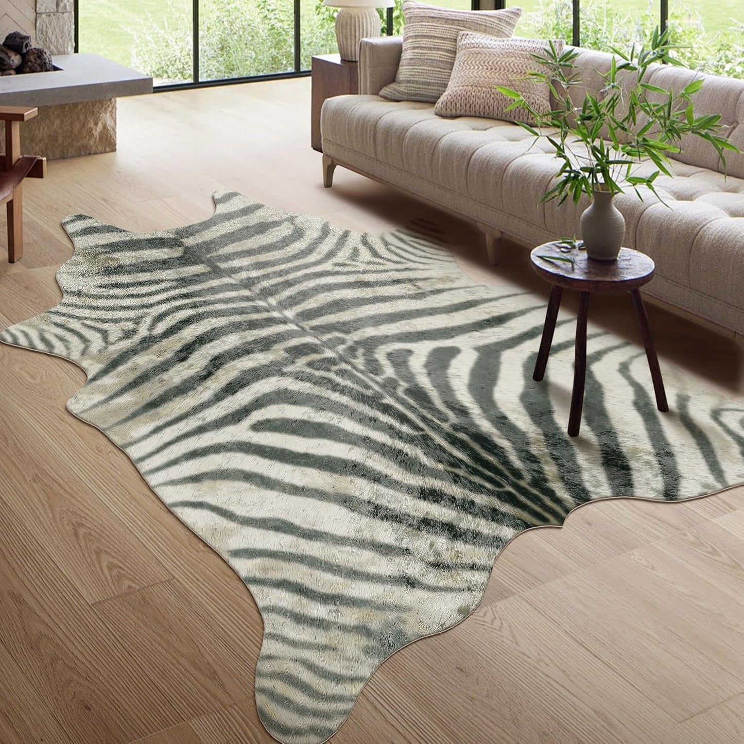 Faux zebra hide rug for dorm decor, laid out on floor.