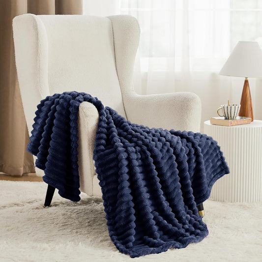 Dorm throw blanket navy minky on chair