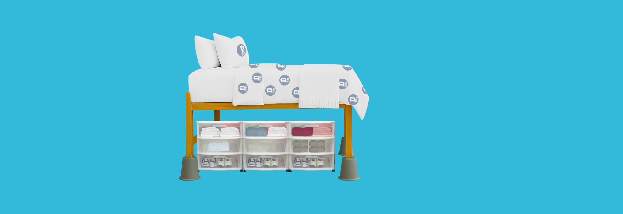 Twin bed with white bedding and storage bins on a blue background for dorm storage
