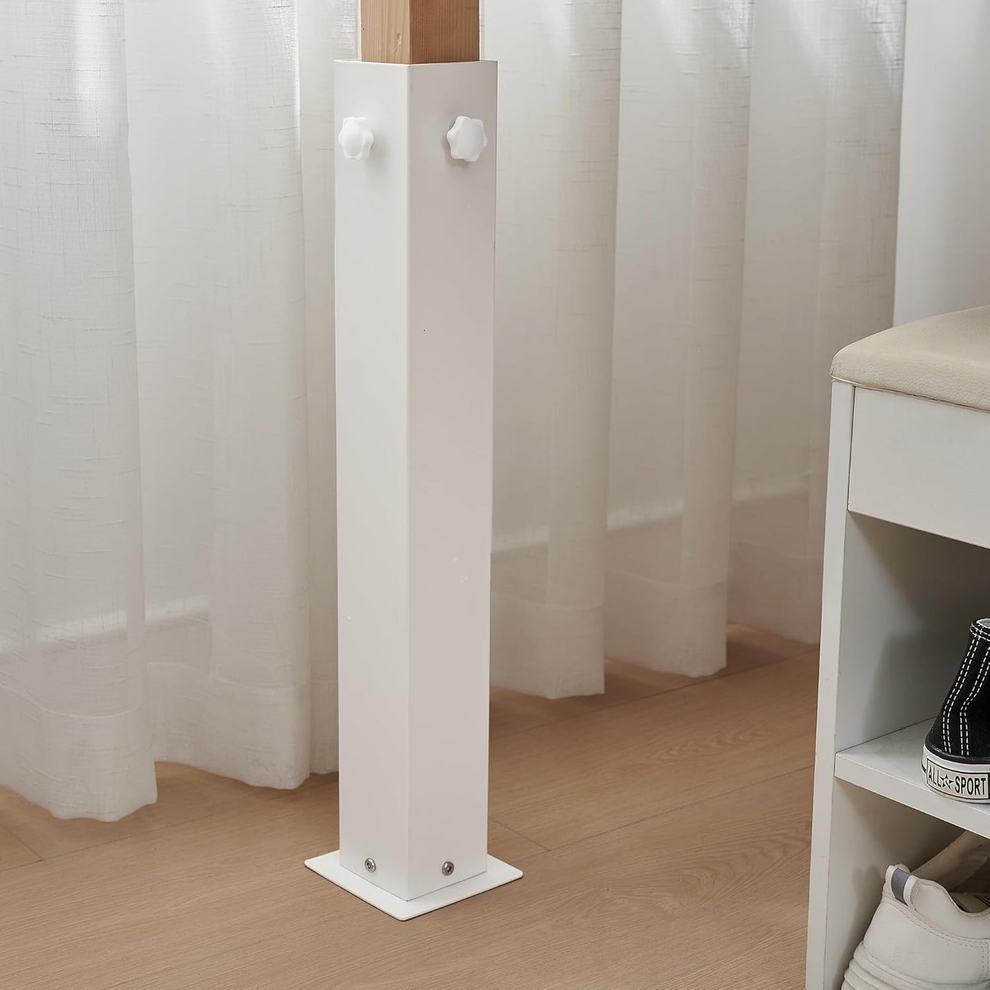White metal risers for twin XL bed to allow for storage bins and drawers underneath