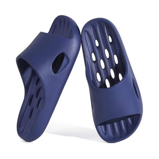 Pair of navy blue slides, shower shoes with ventilation holes perfect for dorm showers