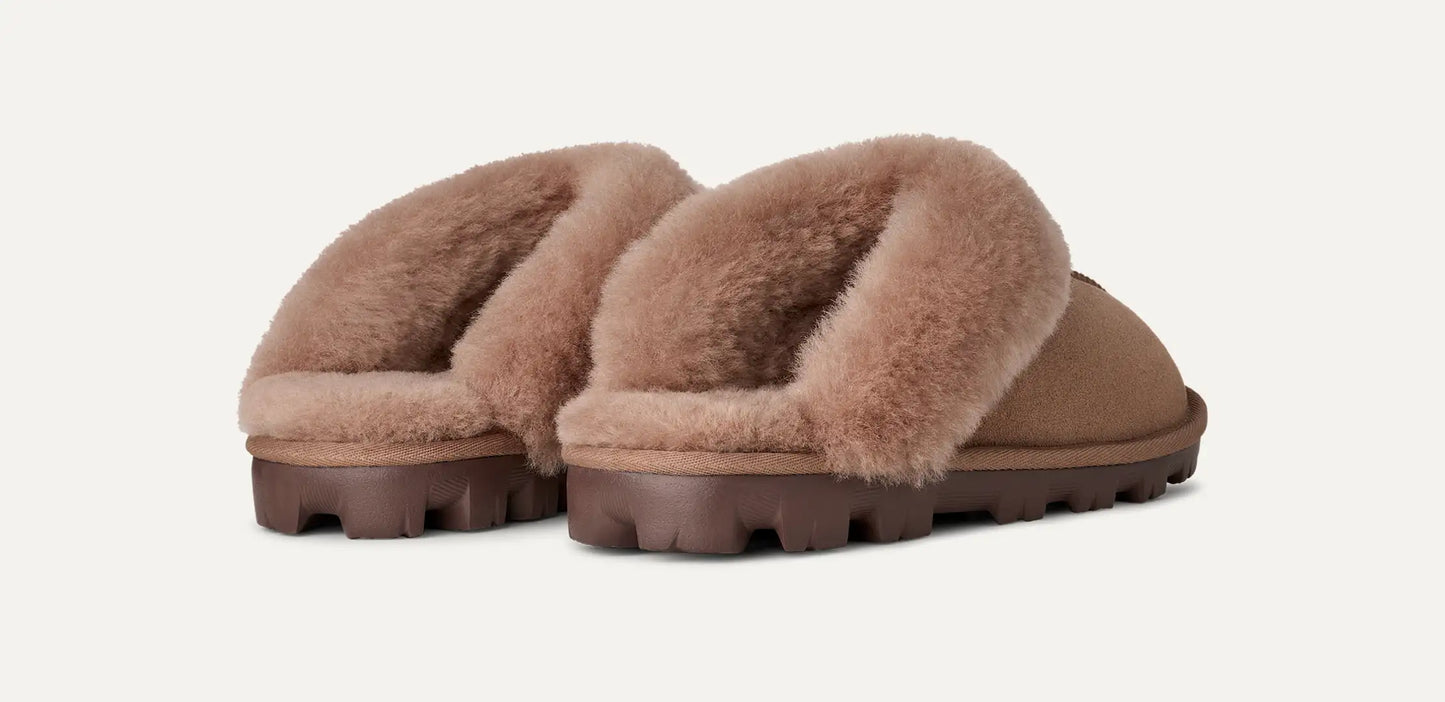 Pair of Ugg brown slippers with fluffy texture perfect for dorm and even for class