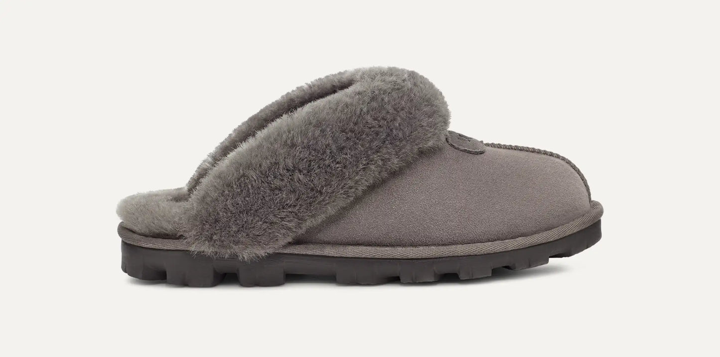 Gray ugg slippers with fuzzy interior perfect for dorms and even for class